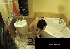 Brunette brushes teeth while BF relaxes in shower