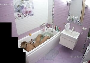 Blonde takes phone to make solo fun in bathroom better