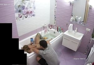 Blonde takes phone to make solo fun in bathroom better