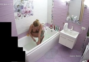 Blonde takes phone to make solo fun in bathroom better