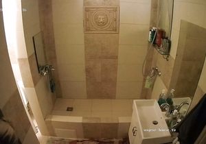 My blonde GF relaxes in shower not knowing about cam