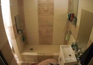 My blonde GF relaxes in shower not knowing about cam