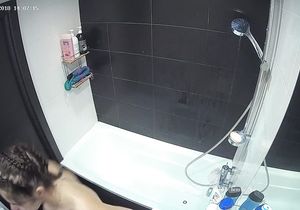 Cute sexpot goes in the shower to relax after work