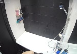 Cute sexpot goes in the shower to relax after work