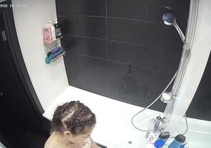 Cute sexpot goes in the shower to relax after work