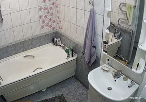 Girl relaxes in bathroom thinking she is alone there