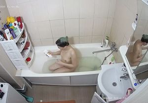 Gal relaxes in the shower not knowing I spy on her