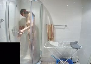 Masked lovers sneak in the shower to prepare for sex