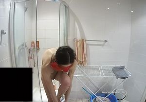 Masked lovers sneak in the shower to prepare for sex