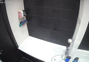 My stepsister takes a shower and exposes her charms