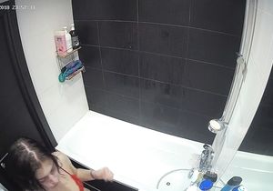 My stepsister takes a shower and exposes her charms