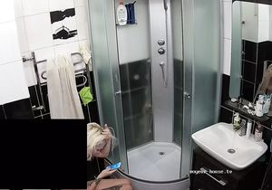 Blonde roommate pees before washing her sexy body