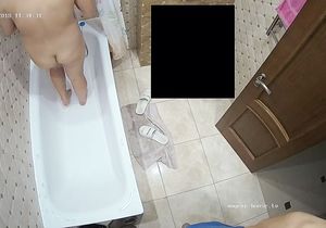 Blonde with saggy tits begins new day in the shower