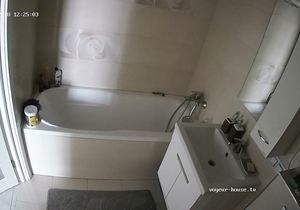 Naked brunette takes hot bath right opposite my camera