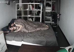 Aroused roommate sneakily fucks chick under blanket