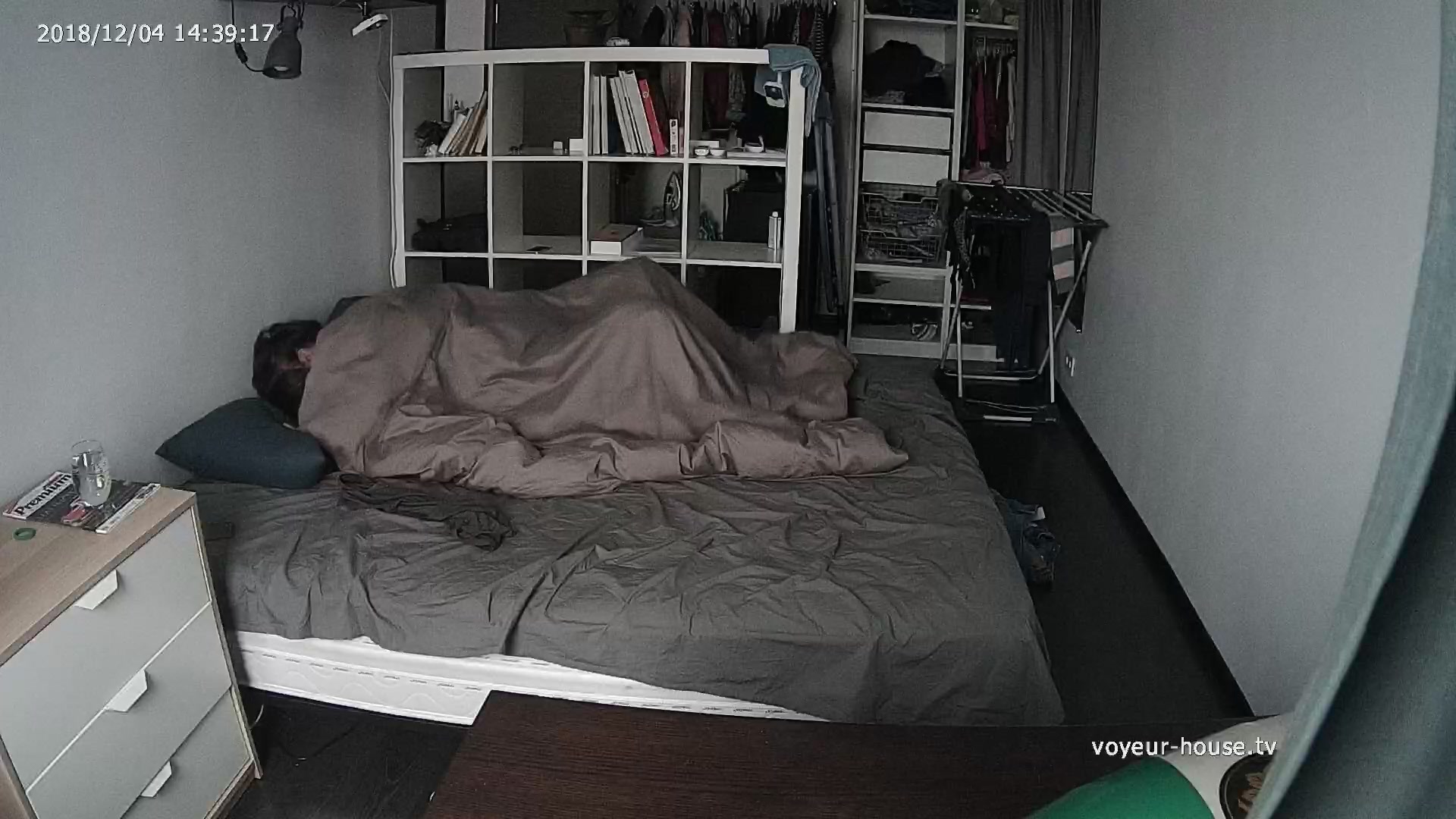 Aroused roommate sneakily fucks chick under blanket