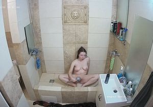 Hottie with perky boobs poses for me in the shower