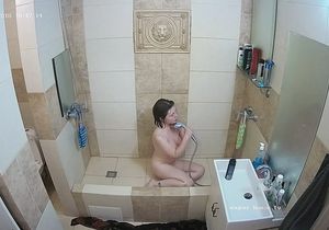 Hottie with perky boobs poses for me in the shower