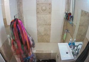 Inked hottie relaxes in the shower with blonde GF