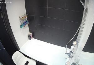 Petite roommate fools around solo in bubble bath