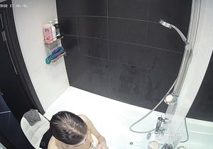 Petite roommate fools around solo in bubble bath