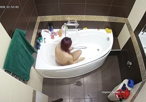 Red-haired roommate takes shower under my camera