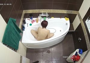 Red-haired roommate takes shower under my camera