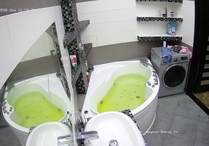 Attractive blonde friend relaxes solo in warm bath