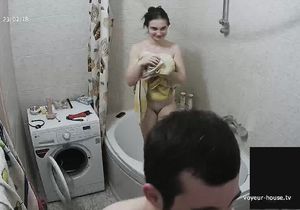 Pretty brunette takes shower before going to sleep