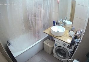 Cutie in the bathroom hides from me behind curtain