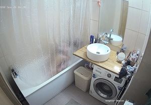 Cutie in the bathroom hides from me behind curtain