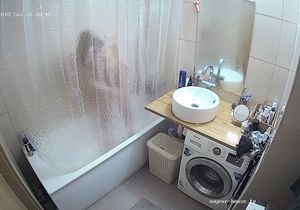 Cutie in the bathroom hides from me behind curtain