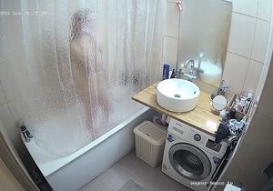 Cutie in the bathroom hides from me behind curtain