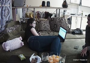 Pretty tenants eat juicy oranges and work on laptop