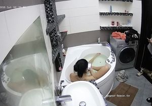 Brunette girl taking a bath is the reason for my boner