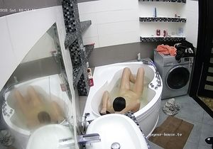 Brunette girl taking a bath is the reason for my boner