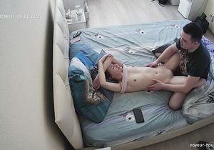 I watch my stepdaughter who lies in bed and touches cock