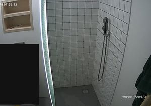 I stare at display while girl is taking a shower