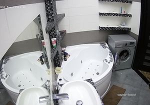 Blonde has solo fun in bathroom washing tattooed body