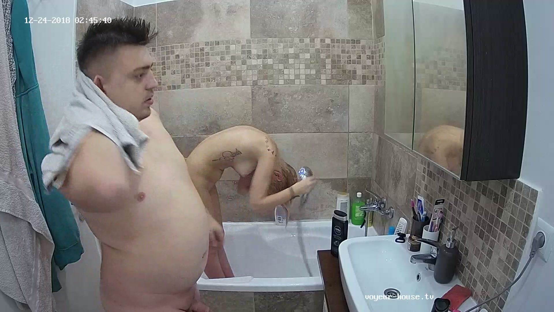 Girl and young man take bath together to save time