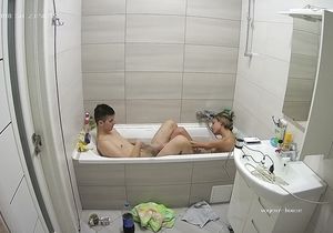 I am spying on sexy young chick in the bathroom