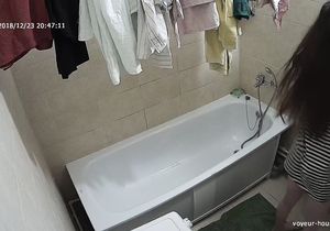 My crush is washing her hair in the shower room