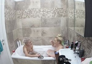 My girlfriend is shaving pussy in the shower room
