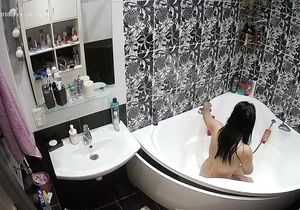 Two lovely brunette chicks naked on hidden cams