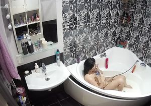 Two lovely brunette chicks naked on hidden cams