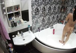 Two lovely brunette chicks naked on hidden cams