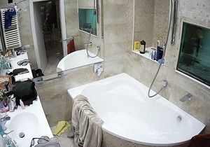Chick with awesome tits taking a shower on my cam