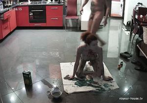 My friends cover their bodies with paint in the kitchen