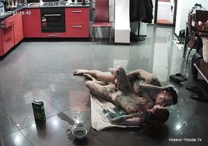 My friends cover their bodies with paint in the kitchen