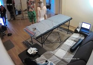My camera films how blonde is about to get massaged